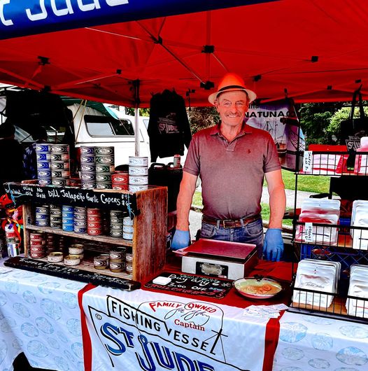 Joe Malley poses at a stand selling a variety of products for St Jude