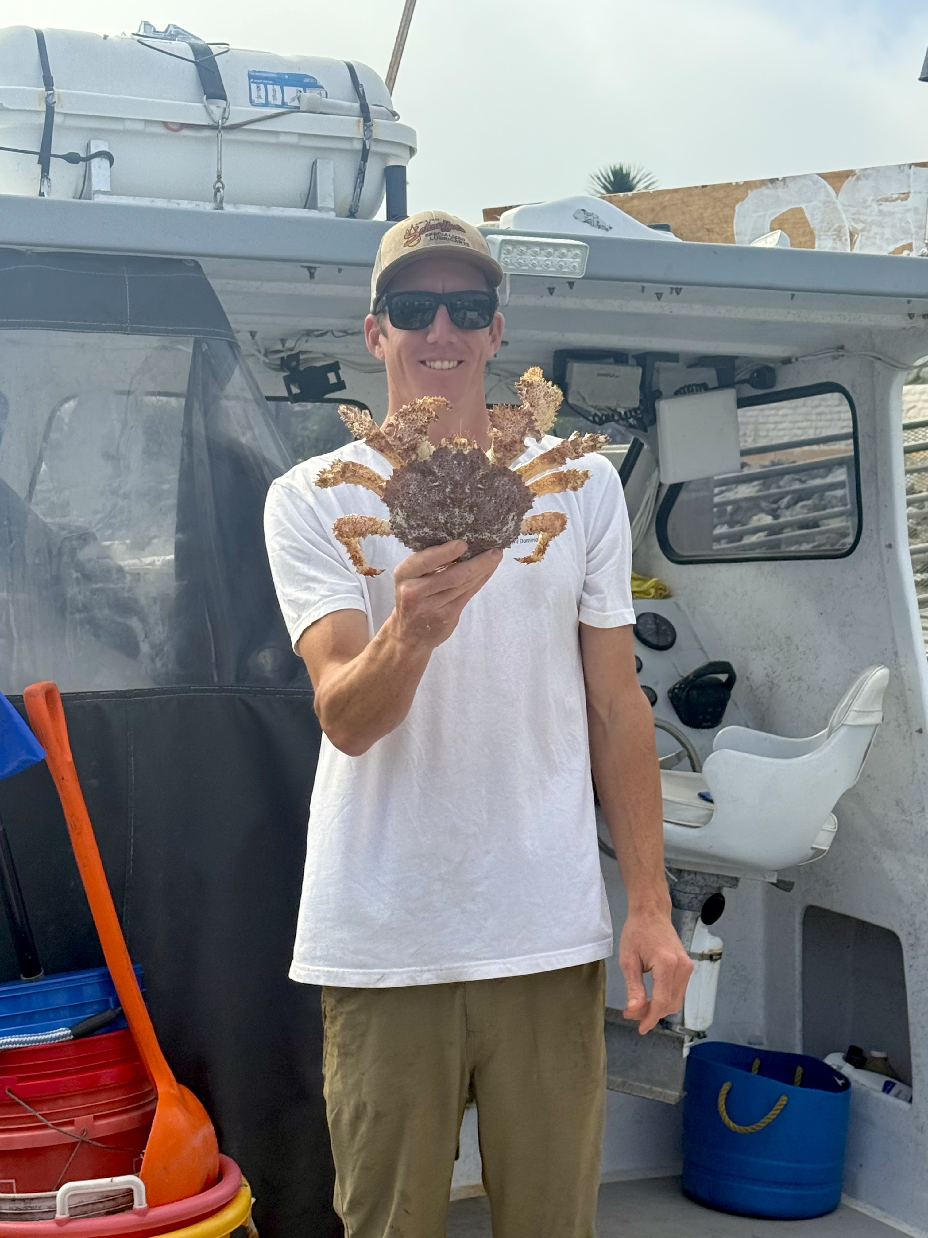 Austin holding a box crab