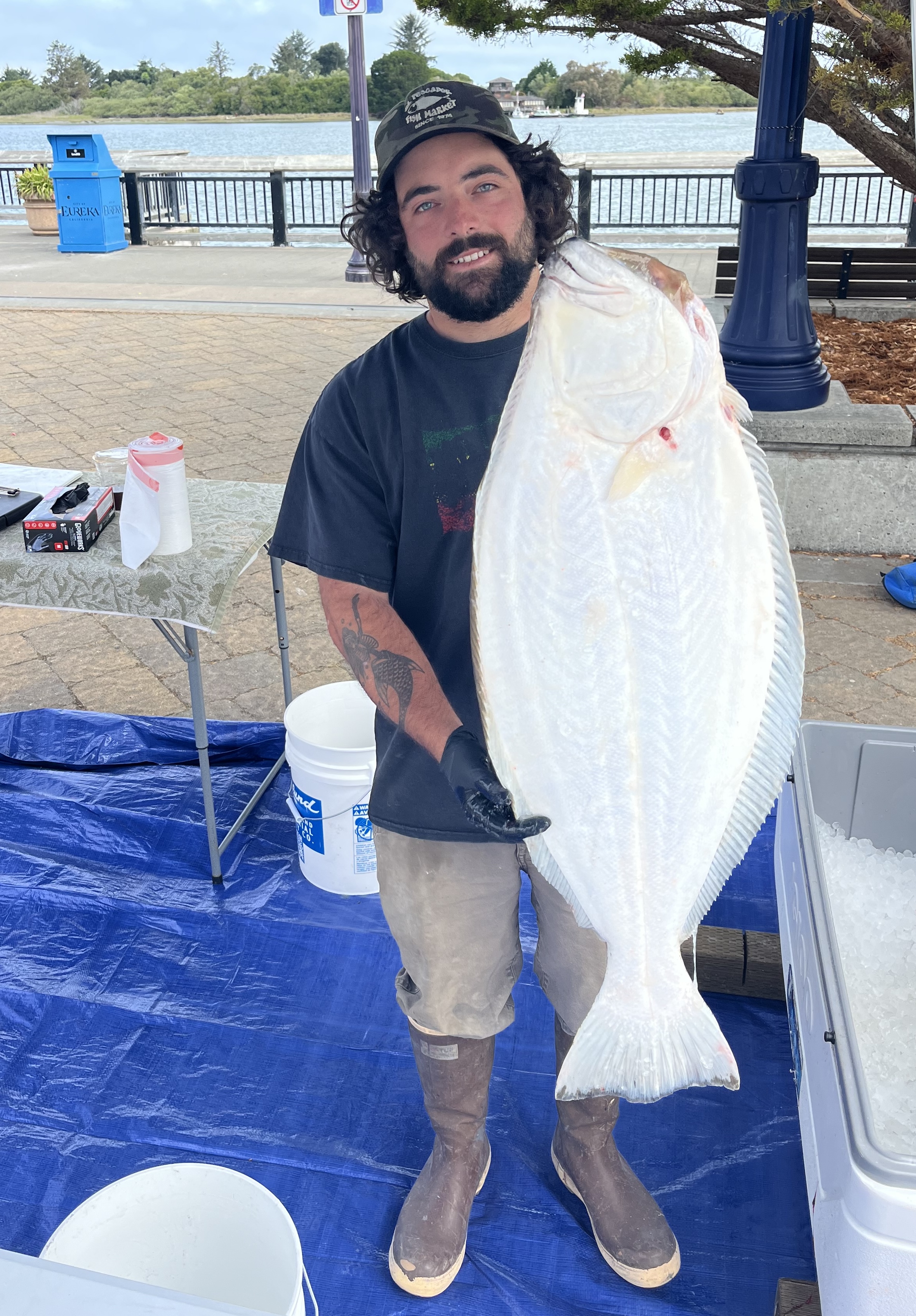 Andrew holding a halibut