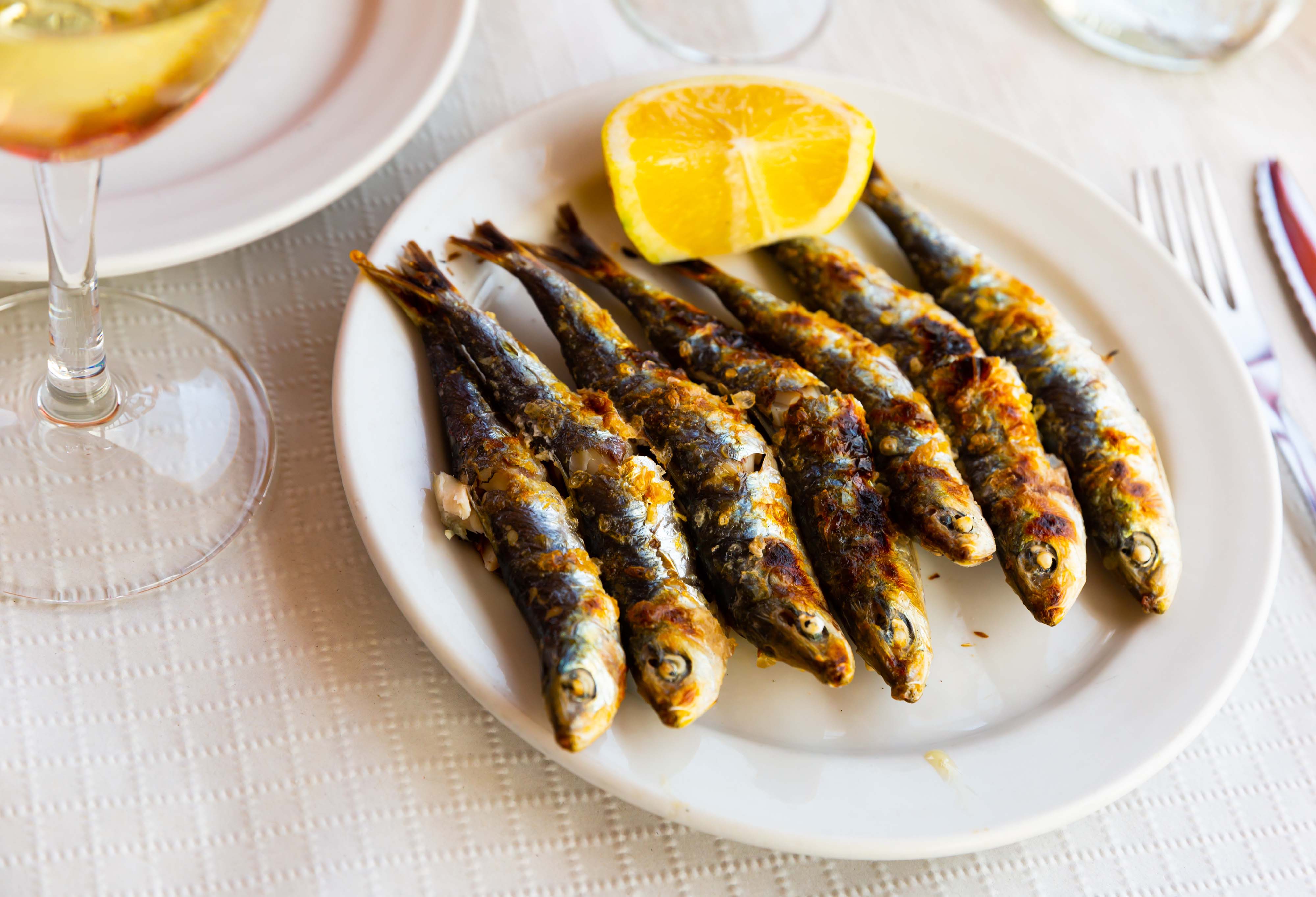 Stock photo of grilled sardines. Credit: JackF, Adobe Stock
