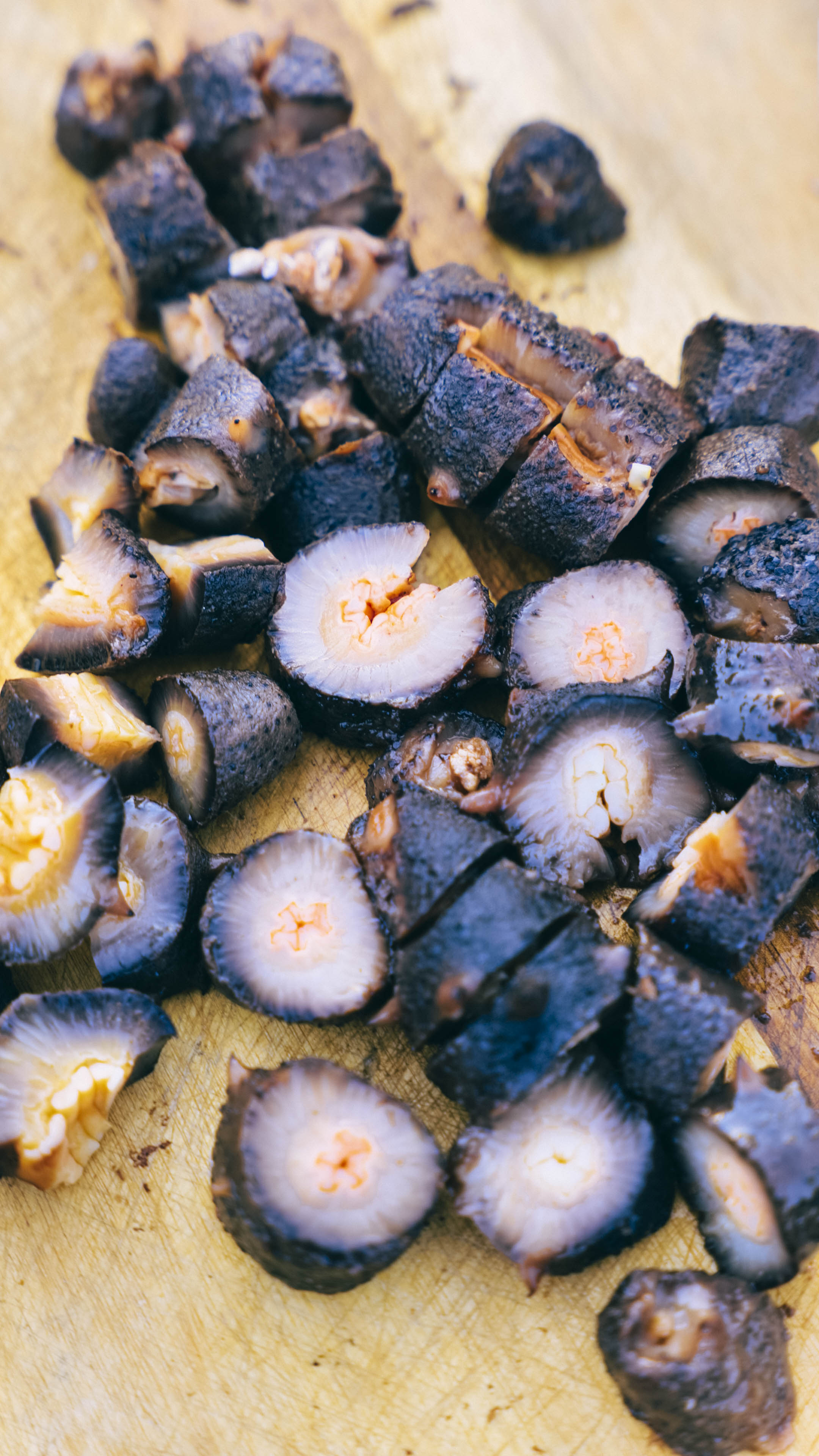 sea cucumber chopped on cutting board