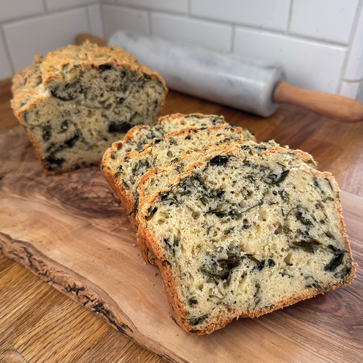 slices of savory sugar kelp cheddar loaf on cutting board