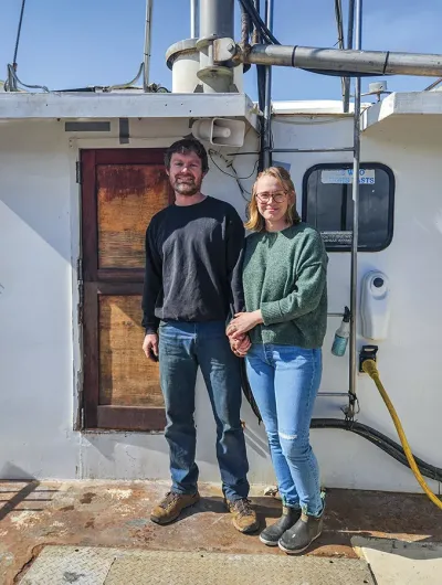 Ashley and Travis on their fishing vessel