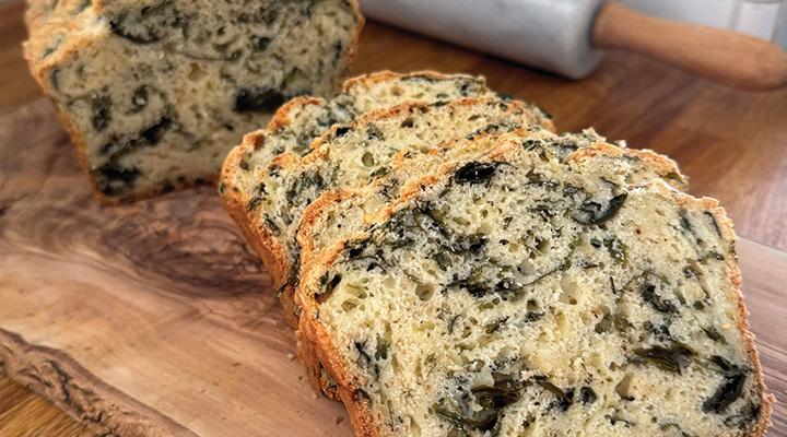 slices of savory sugar kelp cheddar loaf on cutting board