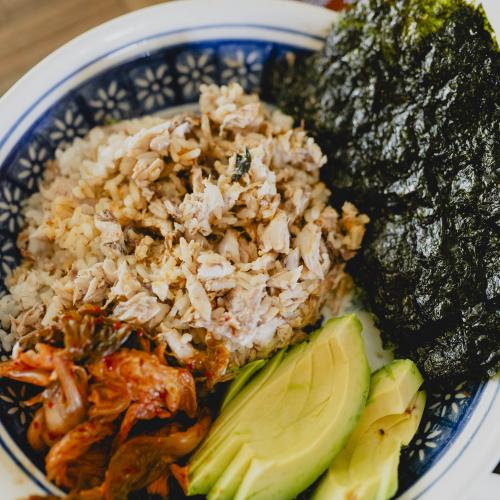 mackerel rice in a bowl with seaweed and avocado
