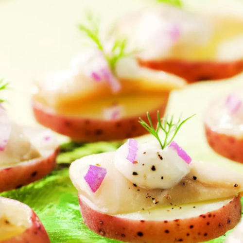 Scandinavian pickled herring bites