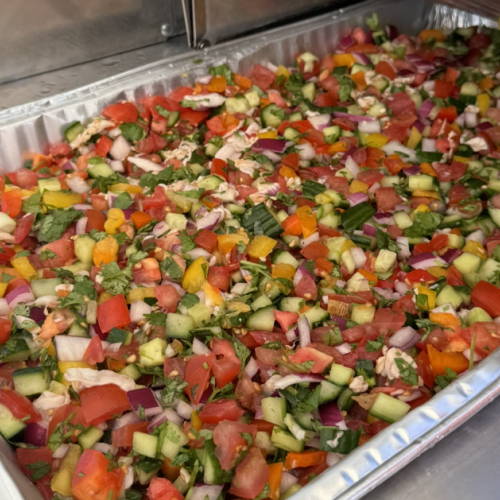 photograph of a tray of geoduck ceviche